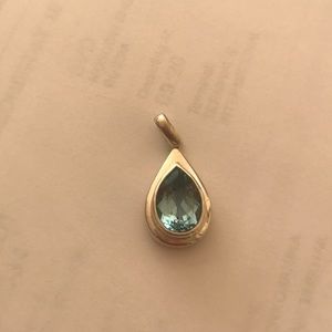 Sterling silver pendant with blue topaz